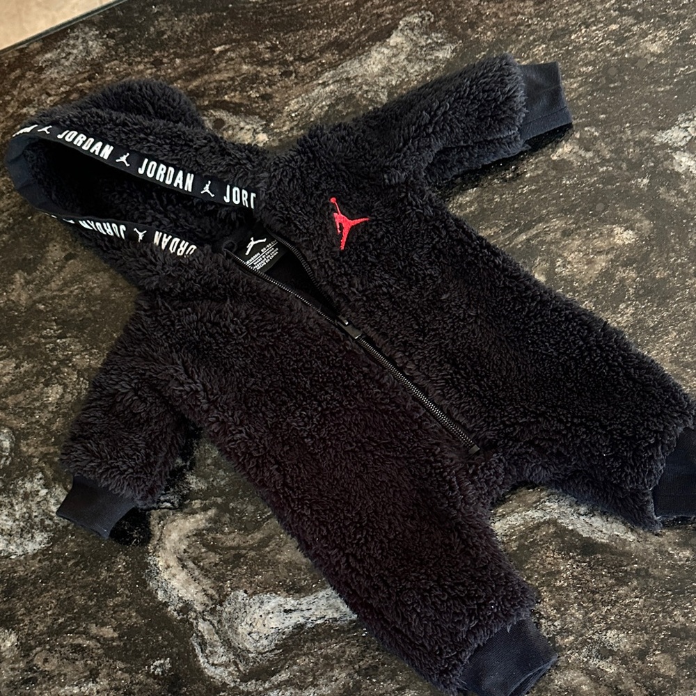 Jordan Cozy Black Sherpa Newborn Onsie